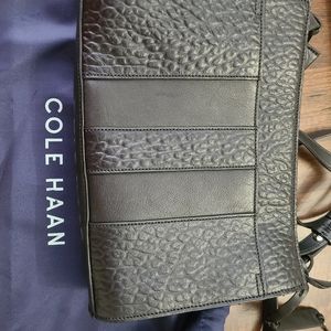 Crossbody purse with dust cover